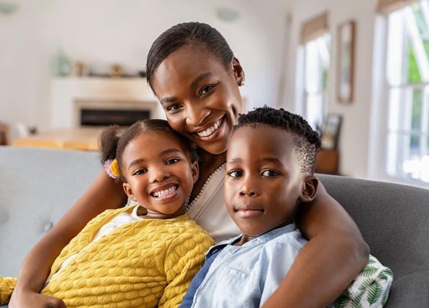 A mother at home with her two children